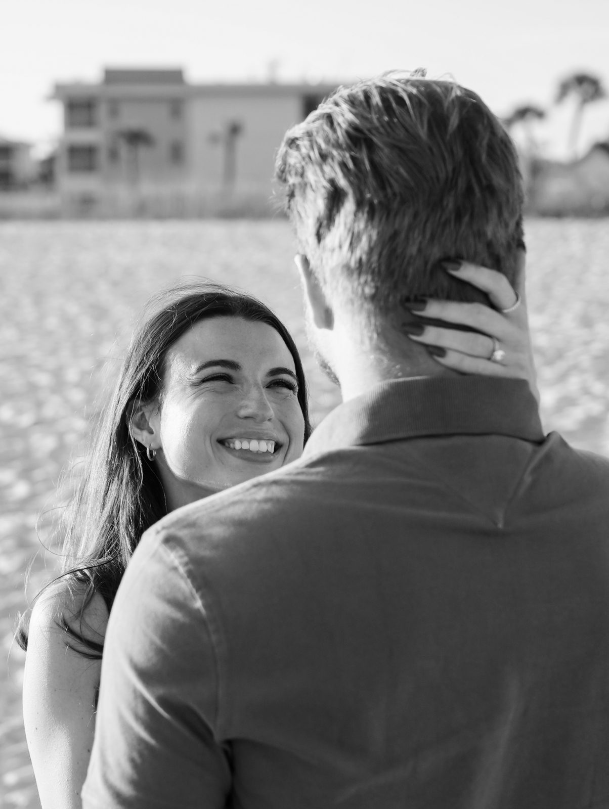 Black and white portrait of a couple on the beach