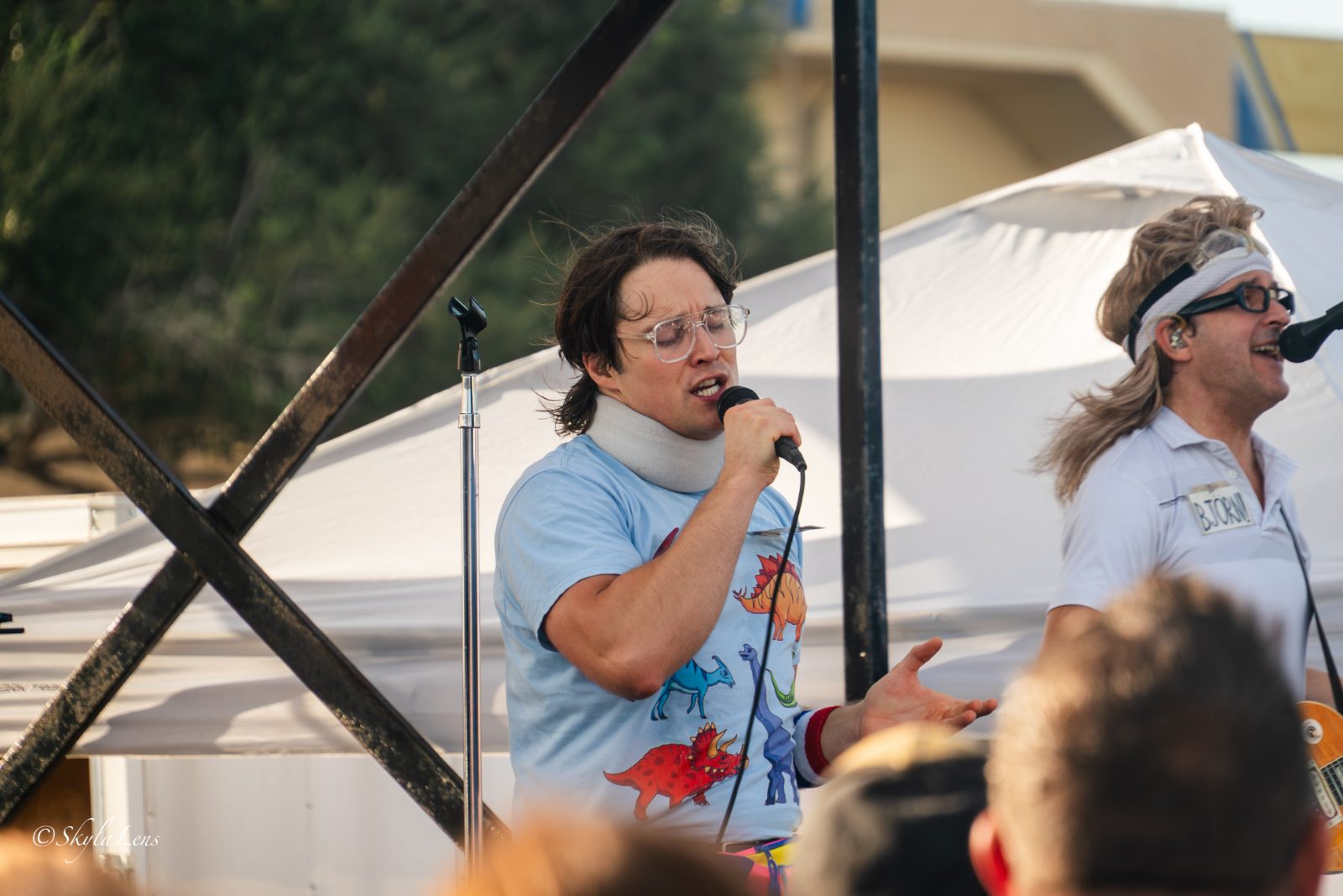 Performer on stage with a microphone