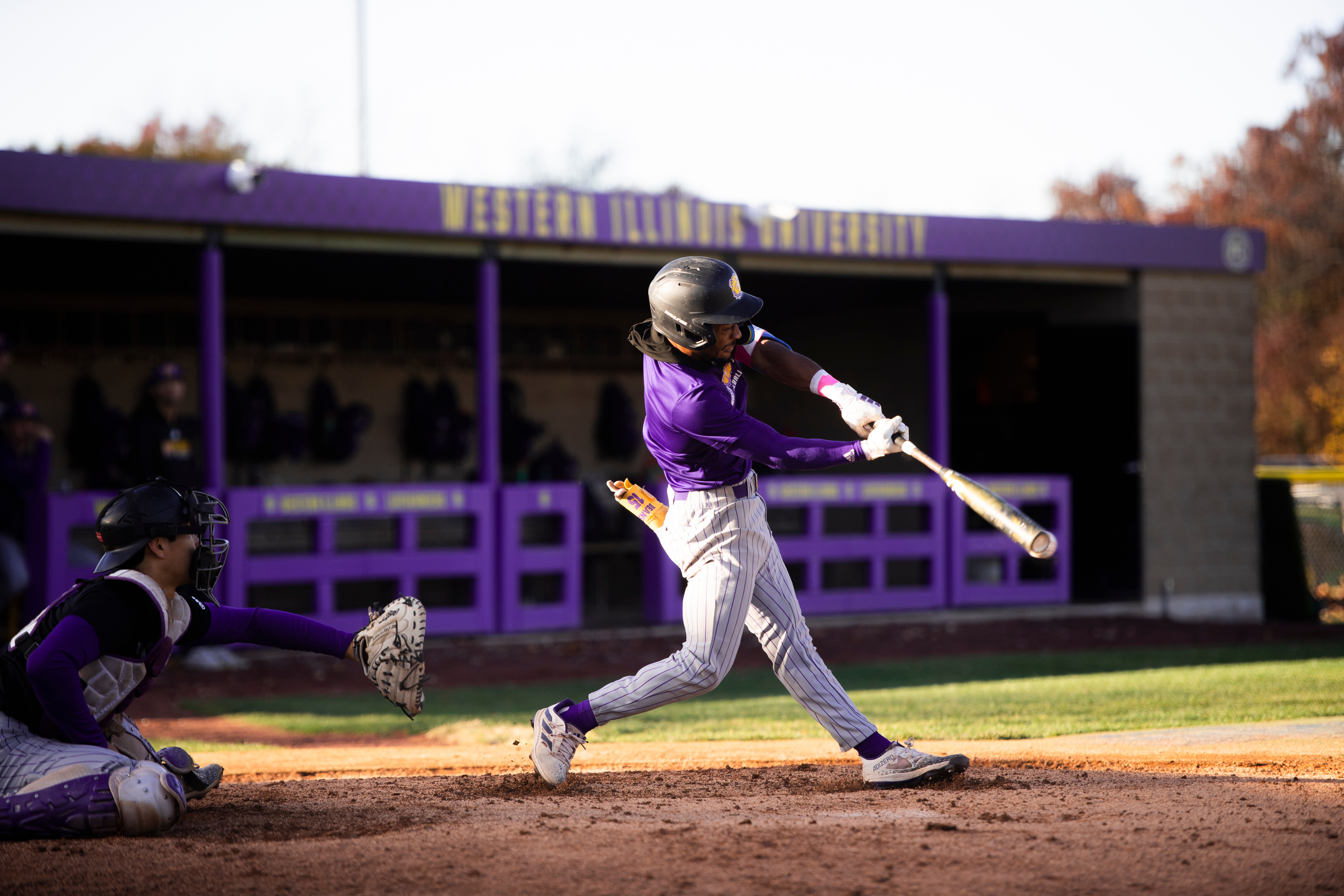 Athlete photographed mid-swing by By Skyla